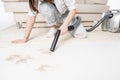 Woman with vacuum cleaner Royalty Free Stock Photo