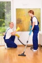 Woman vacuuming floor