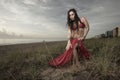 Woman with a veil on the beach Royalty Free Stock Photo