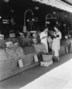 Woman and vendor at open air market