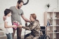 Woman Veteran In Wheelchair Homecoming Concept. Royalty Free Stock Photo