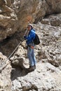 Woman on via ferrata Royalty Free Stock Photo