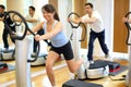 Woman on vibration plate in a gym Royalty Free Stock Photo