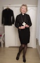 Woman vicar holding a wooden cross Royalty Free Stock Photo