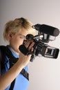 Woman with video camera Royalty Free Stock Photo