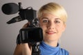 Woman with video camera