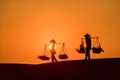 Woman with Vietnam culture traditional dress on sandune during sunset ,traditional costume ,Muine Vietnam..Silhouette woman with