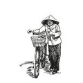 Woman in vietnamese conical hat walking with bicycle