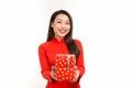 Woman in vietnamese traditional dress holding a gift box for a tet holiday Royalty Free Stock Photo
