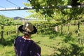 A woman views Albarino Grapevines in MeaÃÂ±o Spain Royalty Free Stock Photo