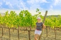 woman in vineyards of Tuscany