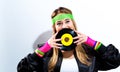 Woman with a vinyl record in 1980`s fashion