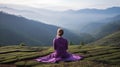 woman in violet cloth doing yoga on tea plantations in Munnar hill Royalty Free Stock Photo