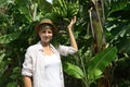 Woman visiting banana plantation