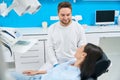 Woman visiting dentist office, routine check-up to prevent dental problems Royalty Free Stock Photo