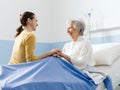 Woman visiting her grandmother at the hospital