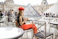Woman visiting Louvre in Paris