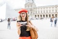 Woman visiting Louvre in Paris