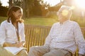 Woman Visiting Senior Male Relative In Assisted Living Facility