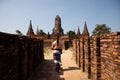 Woman visiting thai temple ruins in Ayuthaya
