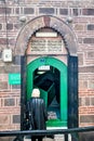 Woman visitor entering the Tomb of Kar Yagdi Hatun snowed lady from Ottoman architecture era built in 1577 in Altindag, Ulus,
