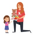 Woman volunteer giving a girl books and bear teddy