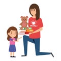 Woman volunteer giving a girl books and bear teddy