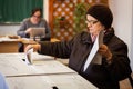 Woman voting at polling station