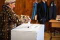 Woman voting at polling station