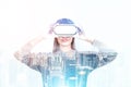 Woman in VR glasses, modern cityscape