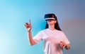 Woman with VR virtual reality goggles