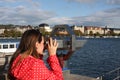 Woman waching a landmarks od Zurich in Swiss.