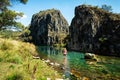 Woman wading in one of the spectacular gorges of Snowy Mountains Australia