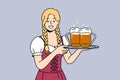 Woman waiter with beer on tray smiles, inviting to visit bavarian festival to try alcoholic drinks Royalty Free Stock Photo