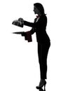 Woman waiter butler opening catering dome silhouette