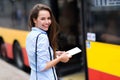 Woman waiting at bus stop Royalty Free Stock Photo