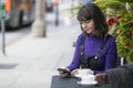 Woman Waiting for a Friend at a Local Sidewalk Cafe Royalty Free Stock Photo