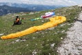 Woman is waiting for paragliding on the mountain. Krippenstein mountain in the Dachstein Mountains. Austria Royalty Free Stock Photo