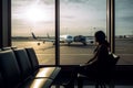 Woman waiting room airport. Generate Ai Royalty Free Stock Photo