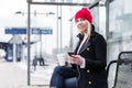 Woman waiting for suburban train in station Royalty Free Stock Photo