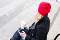 Woman waiting for suburban train in station Royalty Free Stock Photo