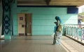 A woman waiting at the train station in Kuala Lumpur, Malaysia Royalty Free Stock Photo
