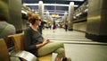 Woman waiting on underground station