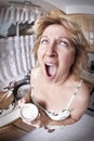 Woman waking up with a coffee Royalty Free Stock Photo