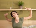 Woman waking up stretching Royalty Free Stock Photo