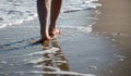 Woman on a walk on the beach in Los Angeles, California Royalty Free Stock Photo