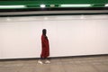 Woman walking alone at night Royalty Free Stock Photo
