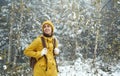 Woman walking alone in winter forest, enjoying wilderness. Winter is coming Royalty Free Stock Photo