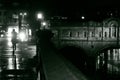 Woman walking in Bath on a rainy night Royalty Free Stock Photo