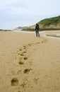 Woman walking on beach